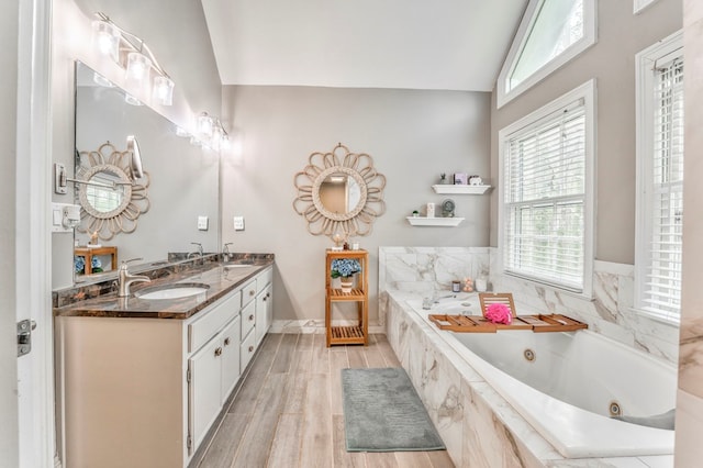 carpeted bedroom with crown molding, visible vents, ceiling fan, baseboards, and ensuite bath