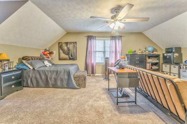 bedroom with a textured ceiling, light colored carpet, visible vents, ceiling fan, and baseboards