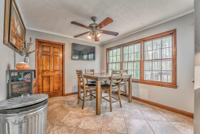 kitchen featuring electric range, under cabinet range hood, dark countertops, dishwasher, and a sink