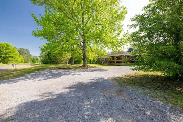 exterior space with gravel driveway