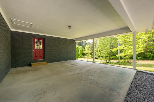 view of patio / terrace featuring a carport