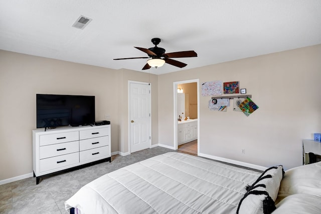 bedroom featuring connected bathroom and ceiling fan