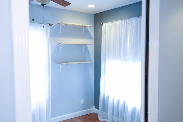 basement featuring carpet floors and a drop ceiling