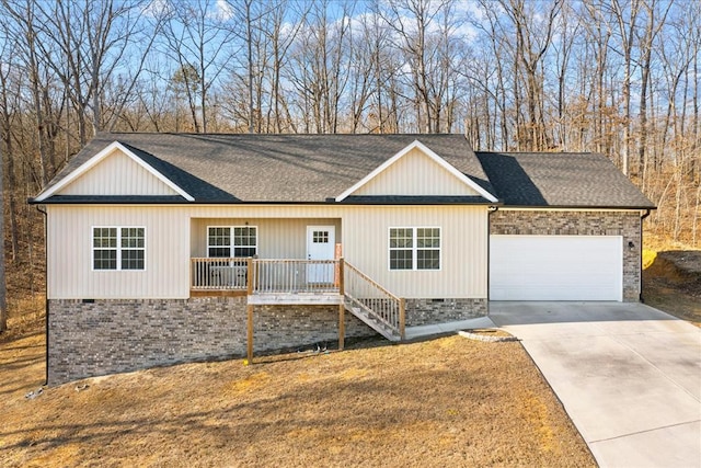 ranch-style home with a garage, covered porch, and a front lawn