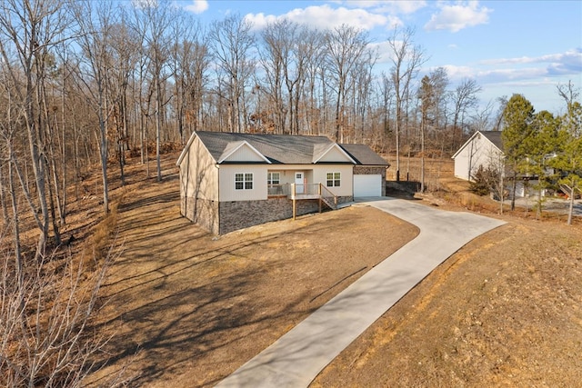 view of front of property with a garage