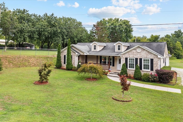 view of front facade featuring a porch and a front lawn