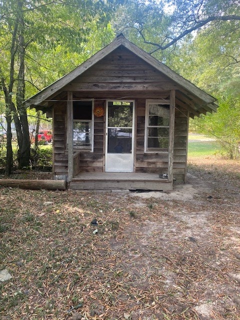 exterior space featuring an outdoor structure