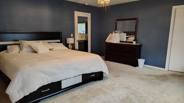 bedroom with baseboards and carpet flooring