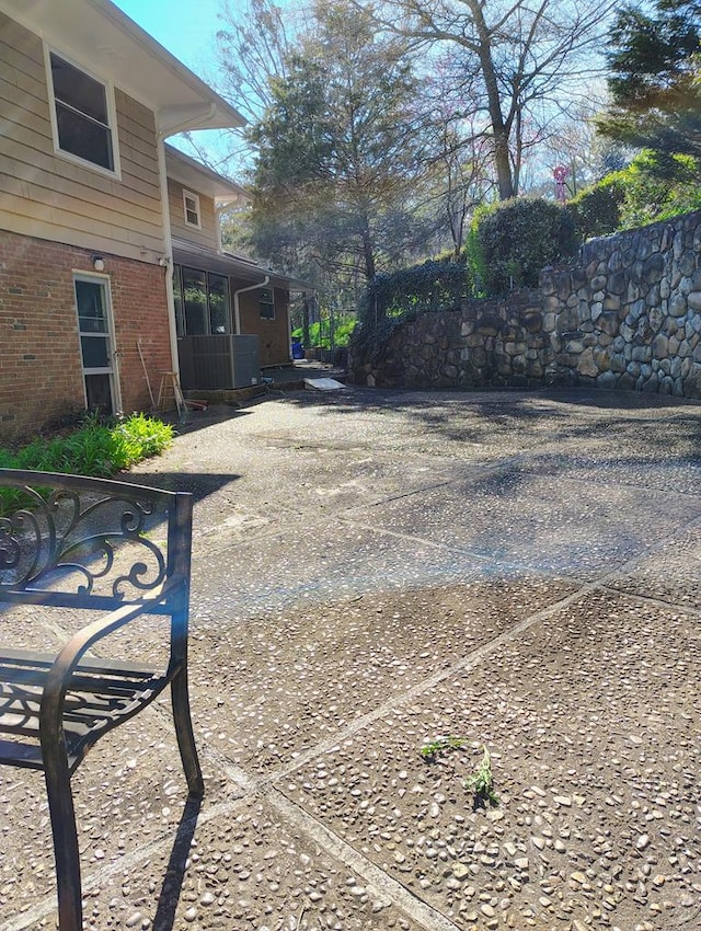 view of yard featuring central AC unit
