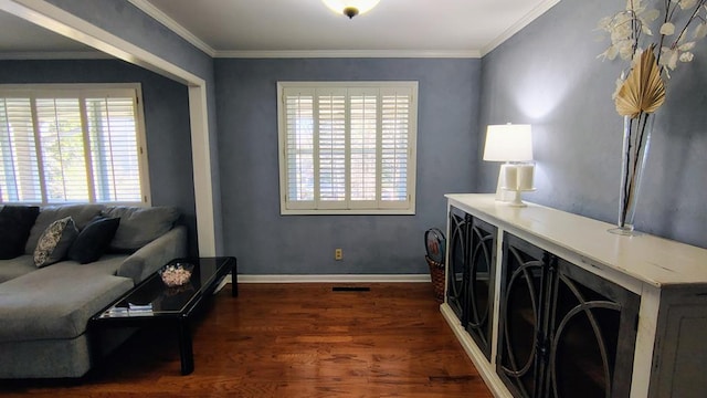 interior space featuring plenty of natural light, dark wood-style floors, and crown molding