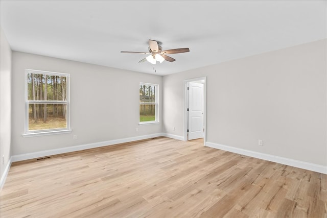 288 Flag Way, Chatsworth, GA 30705 - empty room featuring baseboards, visible vents, light wood-style floors, and a ceiling fan