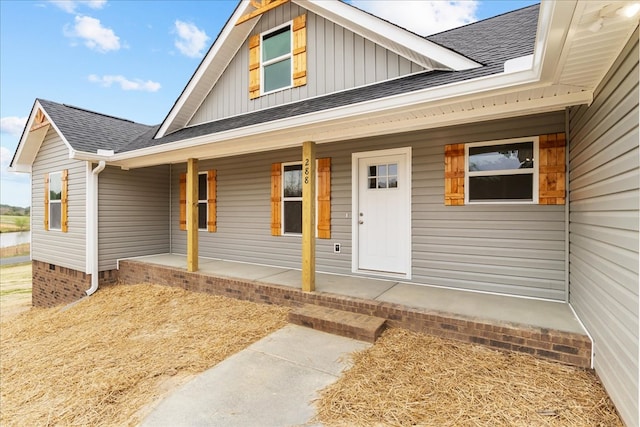 288 Flag Way, Chatsworth, GA 30705 - view of front of property with a shingled roof, board and batten siding, and covered porch
