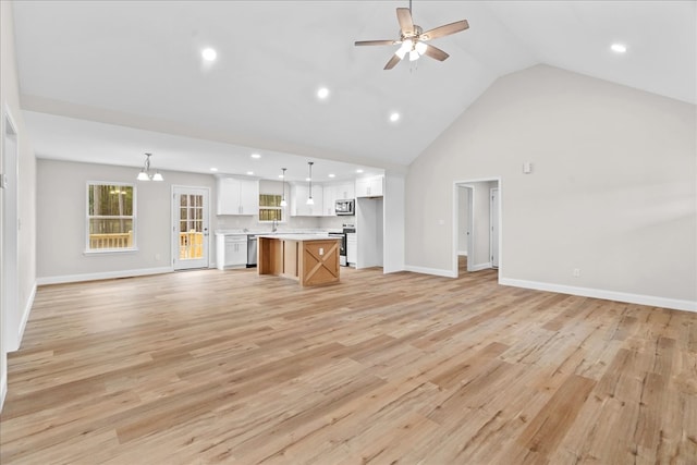 288 Flag Way, Chatsworth, GA 30705 - unfurnished living room with a ceiling fan, baseboards, and light wood-type flooring