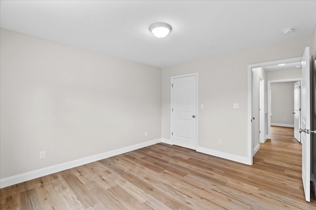288 Flag Way, Chatsworth, GA 30705 - unfurnished bedroom featuring baseboards and light wood-type flooring