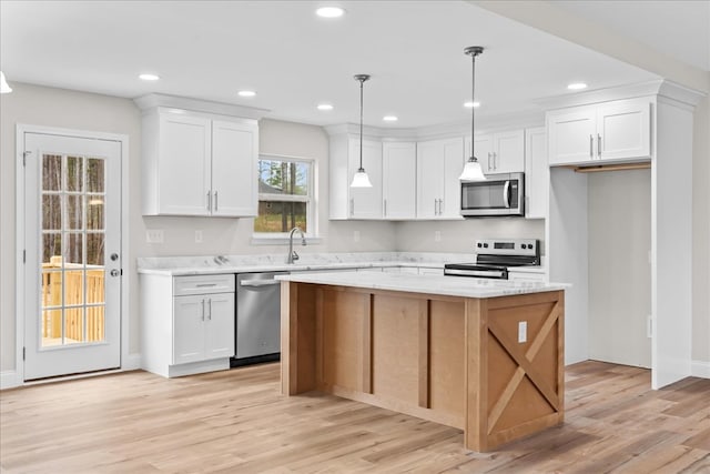 288 Flag Way, Chatsworth, GA 30705 - kitchen featuring white cabinetry, appliances with stainless steel finishes, and light wood finished floors