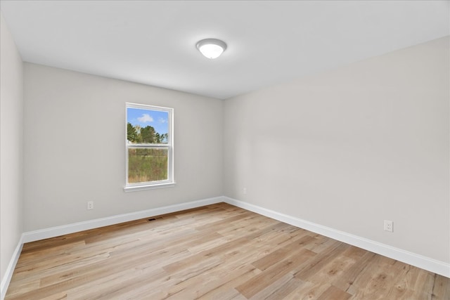 288 Flag Way, Chatsworth, GA 30705 - spare room featuring baseboards, visible vents, and light wood-style flooring
