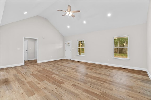 288 Flag Way, Chatsworth, GA 30705 - unfurnished room with baseboards, ceiling fan, high vaulted ceiling, and light wood-style floors