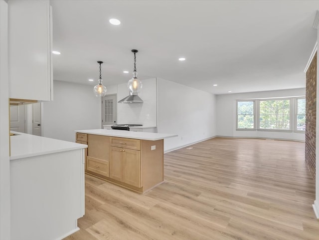 100 Tibbs Rd, Dalton, GA 30720 - kitchen featuring recessed lighting, light wood-type flooring, light countertops, light brown cabinets, and a kitchen island