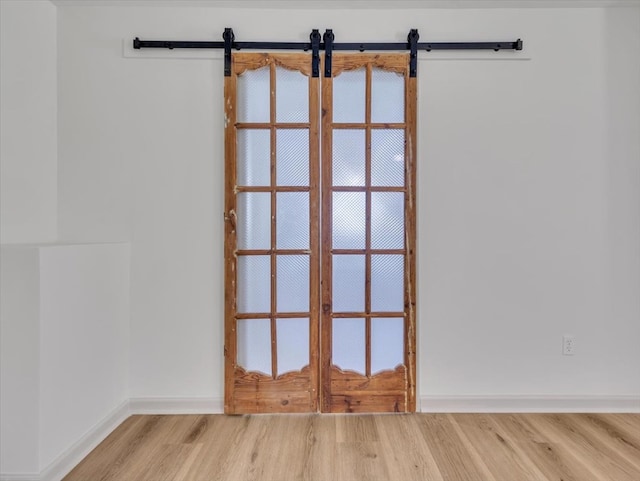 100 Tibbs Rd, Dalton, GA 30720 - detailed view of a barn door and wood finished floors