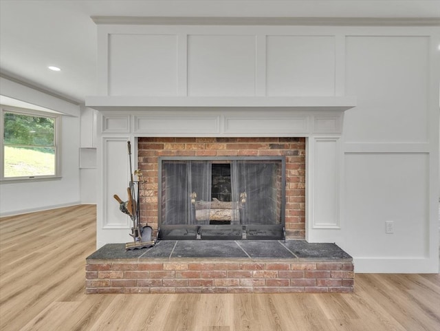 100 Tibbs Rd, Dalton, GA 30720 - detailed view of a brick fireplace, wood finished floors, and recessed lighting