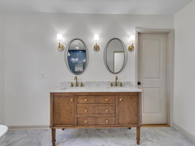 100 Tibbs Rd, Dalton, GA 30720 - bathroom featuring double vanity and baseboards