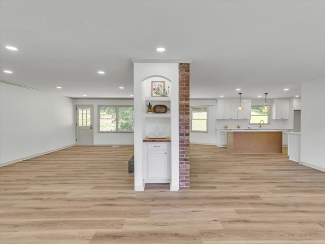 100 Tibbs Rd, Dalton, GA 30720 - unfurnished living room featuring light wood-style flooring and recessed lighting