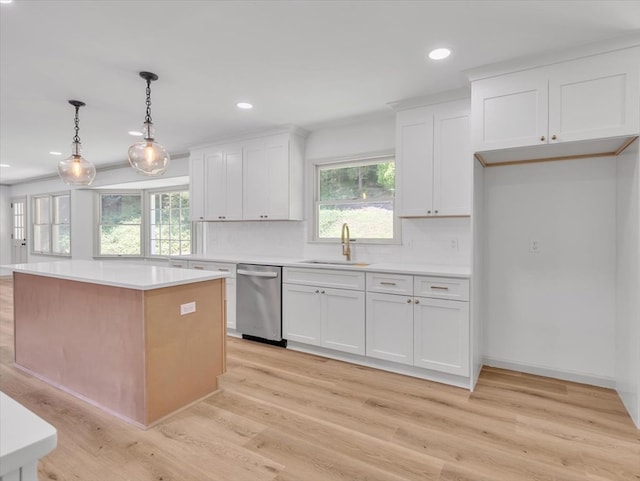 100 Tibbs Rd, Dalton, GA 30720 - kitchen with dishwasher, recessed lighting, light wood finished floors, white cabinetry, and light countertops