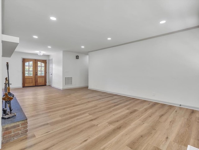 100 Tibbs Rd, Dalton, GA 30720 - unfurnished living room with light wood-style flooring and recessed lighting