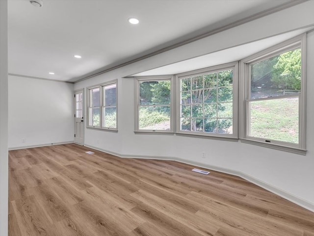 100 Tibbs Rd, Dalton, GA 30720 - spare room with light wood-style flooring, recessed lighting, and crown molding