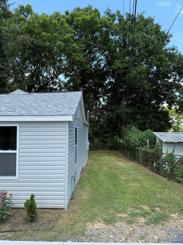 303 Janice St, Dalton, GA 30721 - view of grassy yard featuring an outbuilding