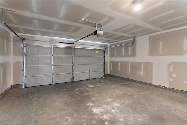 garage featuring a garage door opener