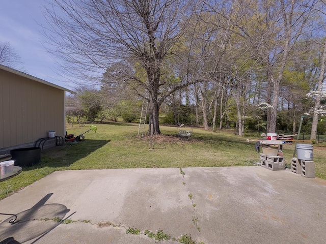 209 Kenemer Cir, Dalton, GA 30720 - view of green lawn featuring a patio area