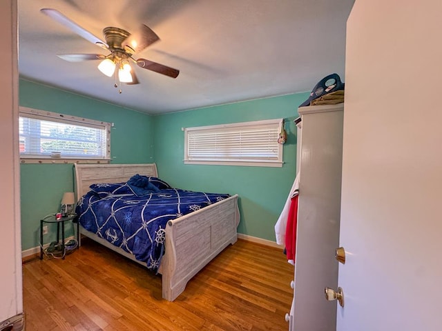 209 Kenemer Cir, Dalton, GA 30720 - bedroom with wood finished floors, baseboards, and ceiling fan