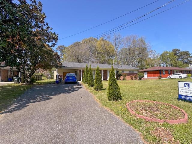 209 Kenemer Cir, Dalton, GA 30720 - ranch-style house featuring driveway, a front yard, and an attached carport