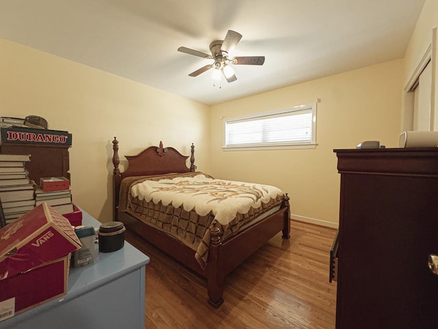 209 Kenemer Cir, Dalton, GA 30720 - bedroom with wood finished floors, a ceiling fan, and baseboards
