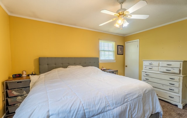 bedroom with crown molding, carpet flooring, and a ceiling fan