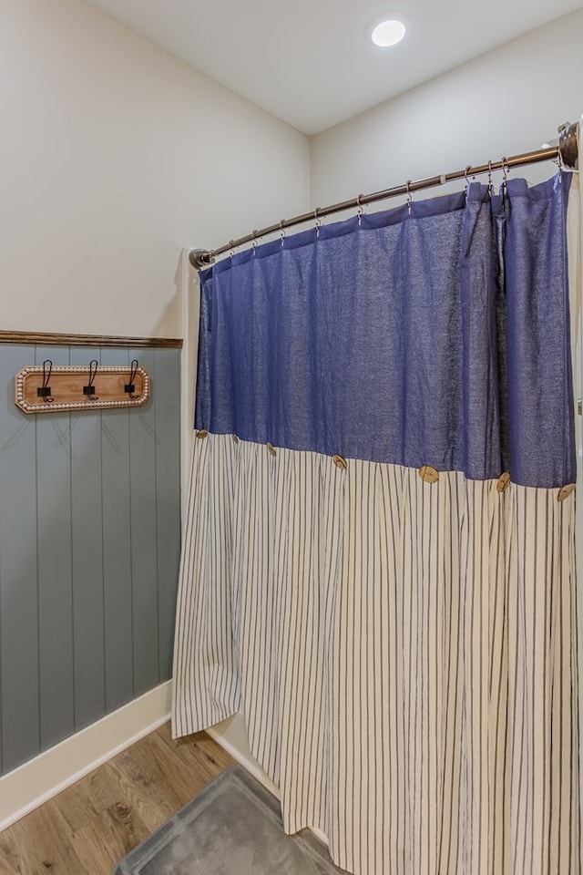 full bath featuring wood finished floors
