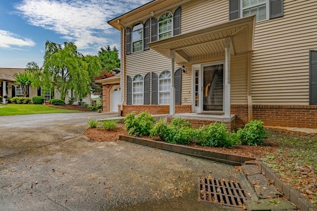 1694 Burnt Oak Dr Unit 208, Dalton, GA 30721 - view of front of home with driveway and brick siding