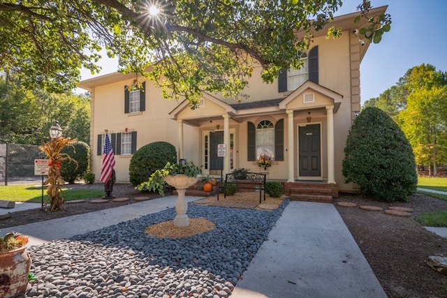 1694 Burnt Oak Dr Unit 208, Dalton, GA 30721 - view of front facade featuring stucco siding and covered porch