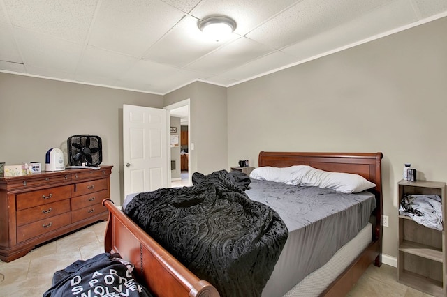 bedroom with crown molding