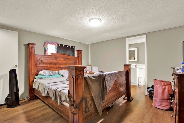 2032 Mill Creek Rd, Rocky Face, GA 30740 - bedroom featuring wood-type flooring and a textured ceiling