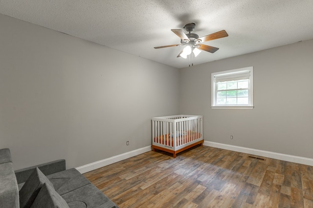 1590 Peavine Rd, Rock Spring, GA 30739 - bedroom with a ceiling fan, baseboards, visible vents, and wood finished floors