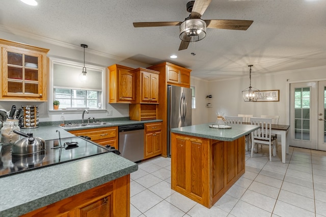 1590 Peavine Rd, Rock Spring, GA 30739 - kitchen with brown cabinets, dark countertops, a sink, a textured ceiling, and stainless steel appliances