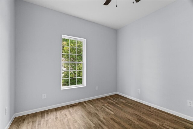 429 Glenwood Ave, Dalton, GA 30721 - unfurnished room featuring a ceiling fan and dark wood-type flooring