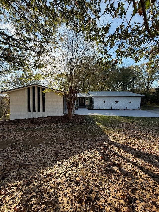 view of front facade featuring a patio area