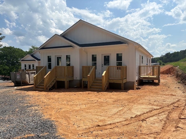 4327 Cronan Dr, Cohutta, GA 30710 - view of front of home featuring board and batten siding, a deck, and stairway