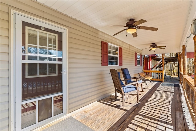 deck featuring a porch and ceiling fan