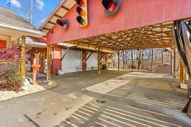 view of patio featuring a storage unit