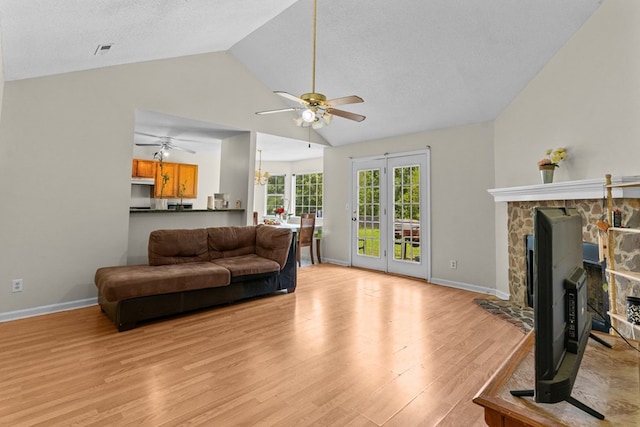 163 Shawn Ln, Chatsworth, GA 30705 - living area featuring a ceiling fan, lofted ceiling, and light wood-type flooring
