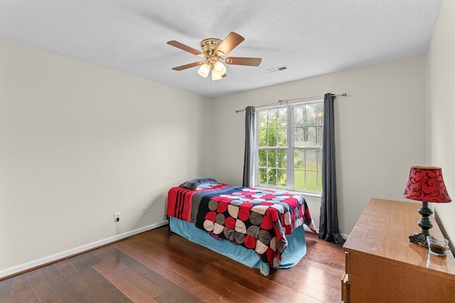 163 Shawn Ln, Chatsworth, GA 30705 - bedroom with hardwood / wood-style flooring, a textured ceiling, and ceiling fan